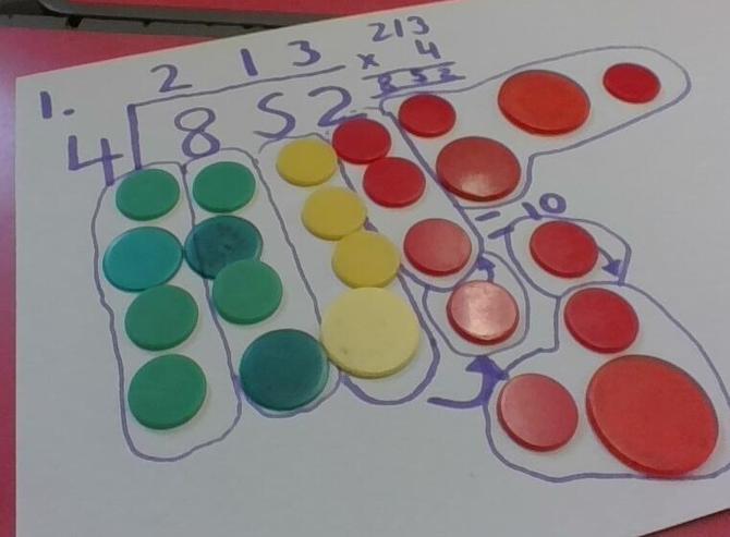 We have been practicing short division using counters.